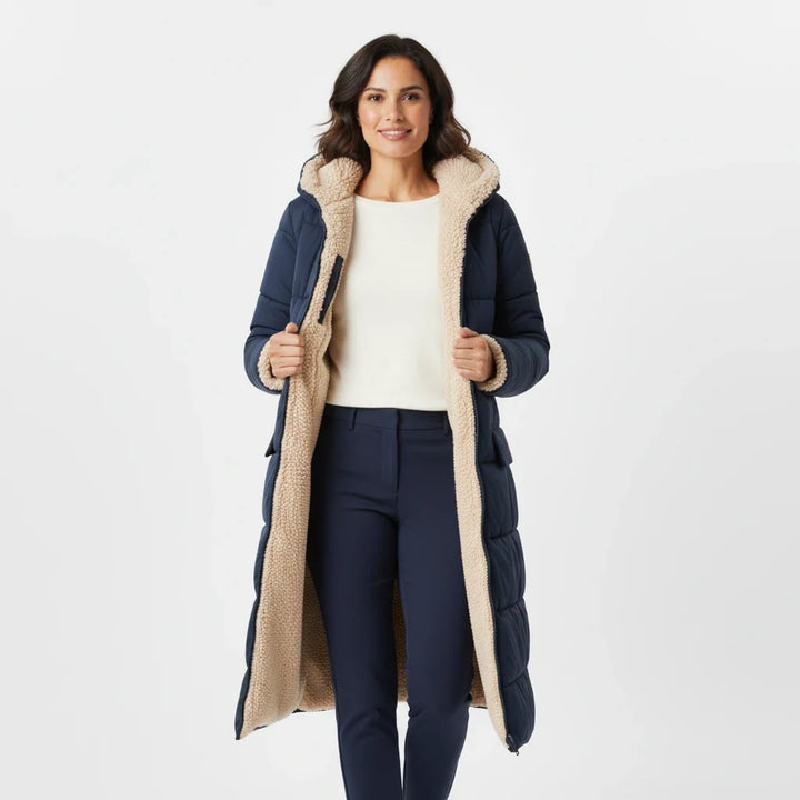 Stylish women's winter puffer jacket, a long hooded coat for ultimate cold weather protection.