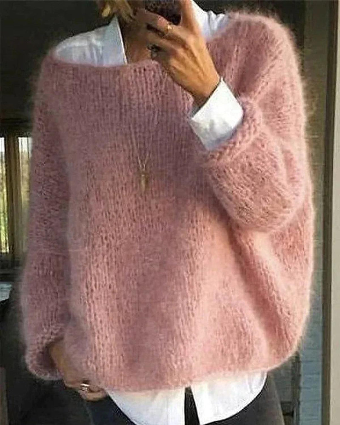 Women's cozy knit long sleeve pullover sweater in a neutral color, perfect for winter casual wear.