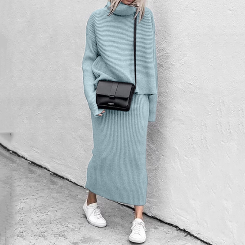 Matching women's knit pullover with long sleeves and a ribbed midi skirt, perfect for a coordinated look.