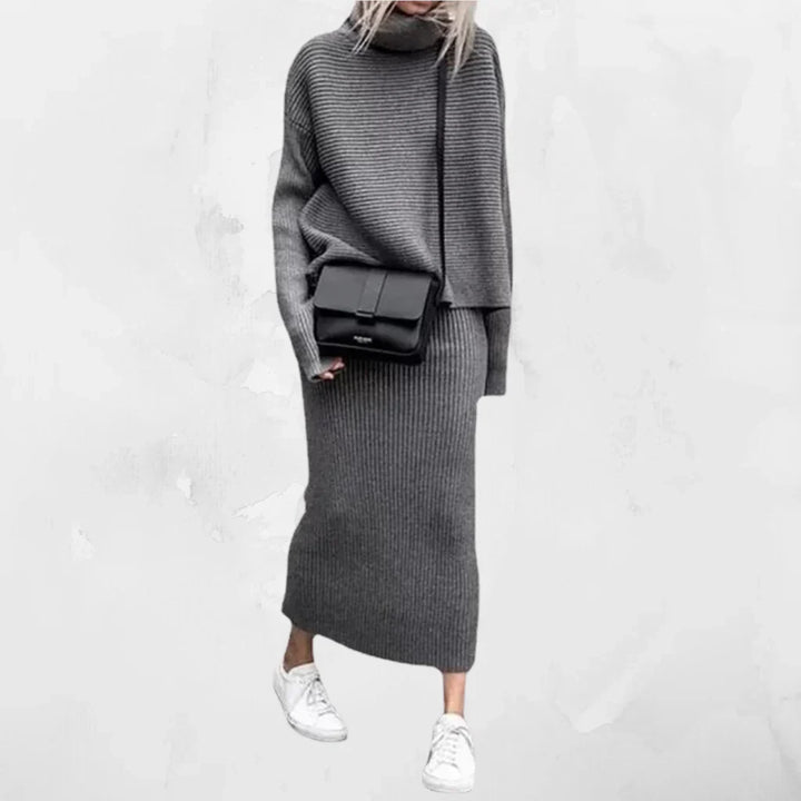 Elegant women's loungewear: a comfortable knitted pullover paired with a complementary ribbed skirt.