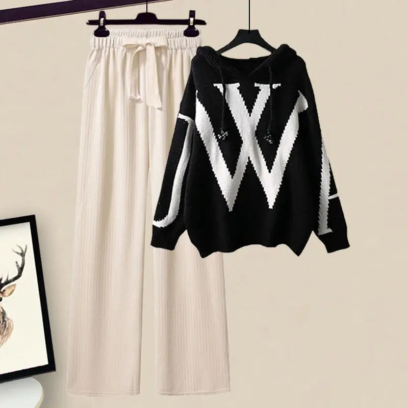 Comfortable women's two-piece knit set featuring an elegant sweater & wide-leg pants.