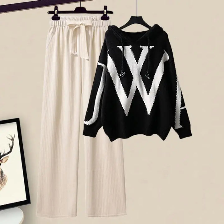 Chic women's two-piece autumn set: cozy knit sweater & comfortable wide-leg pants.