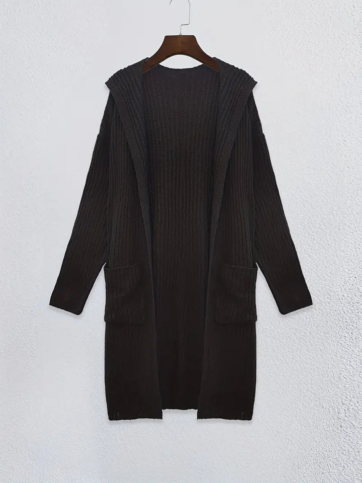 Soft, long knitted cardigan for women, providing cozy warmth and stylish layering in fall & winter.