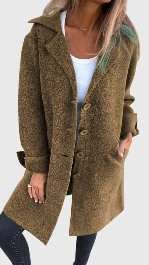 Woman casually styled in a longline blazer, ideal for everyday comfort & chic layering.