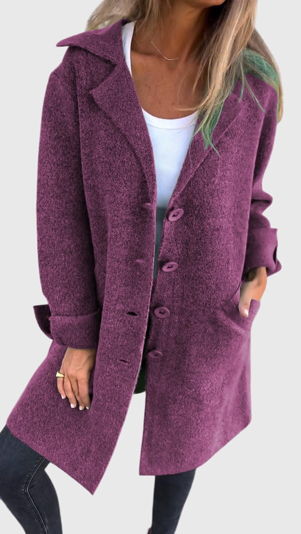 Woman wearing an open longline blazer, demonstrating its versatility as stylish outerwear & layering.