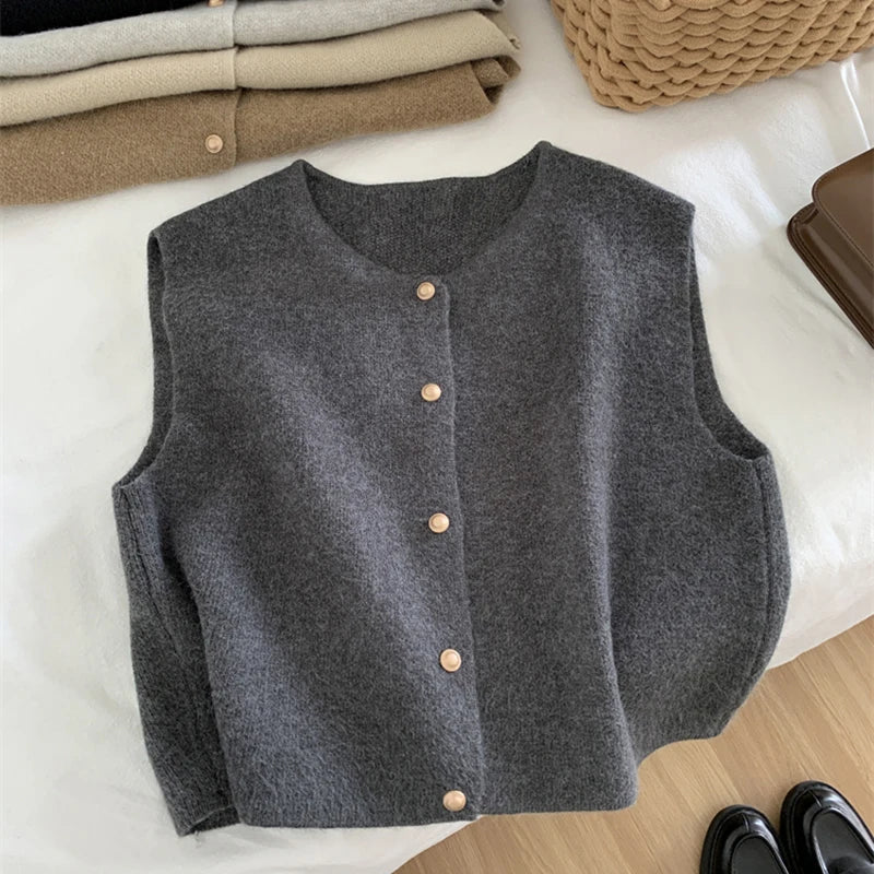 Women's cozy merino wool blend knit gilet, a stylish & warm layering vest.