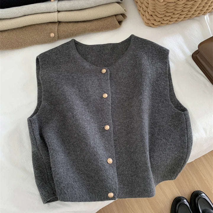 Women's cozy merino wool blend knit gilet, a stylish & warm layering vest.