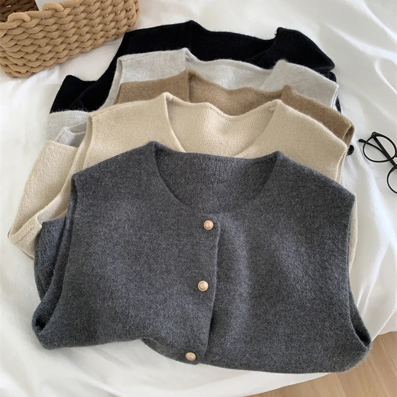 Comfortable & elegant women's merino wool blend knit gilet; a versatile fall/winter layering piece.