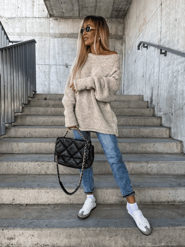 Women's cozy off-shoulder knit jumper in a loose fit, perfect for autumn & winter fashion.