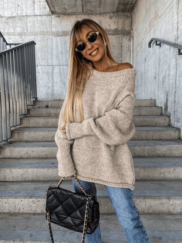 Stylish women's off-shoulder knit sweater. A cozy, long-sleeve top for casual autumn outfits.