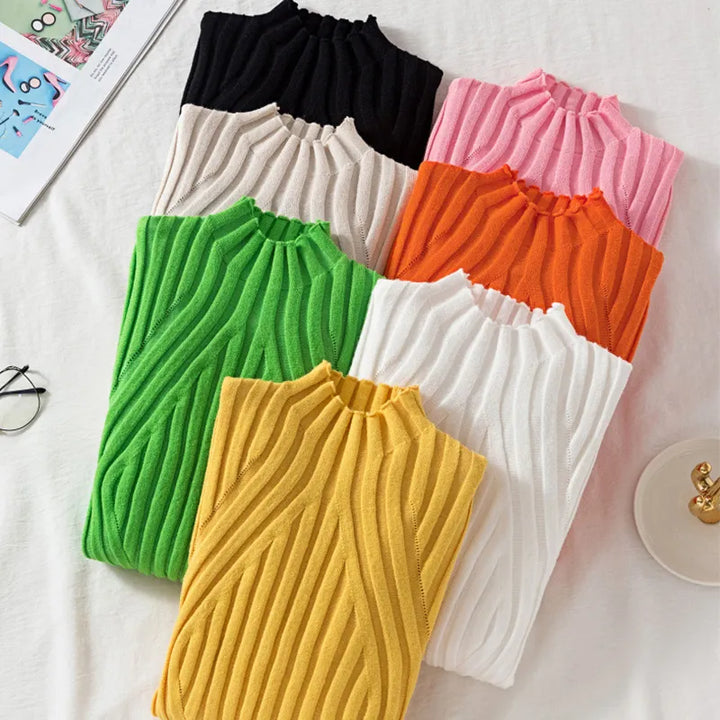 Luxurious feel women's cozy roll neck sweater, long sleeves, ideal for cooler weather fashion.
