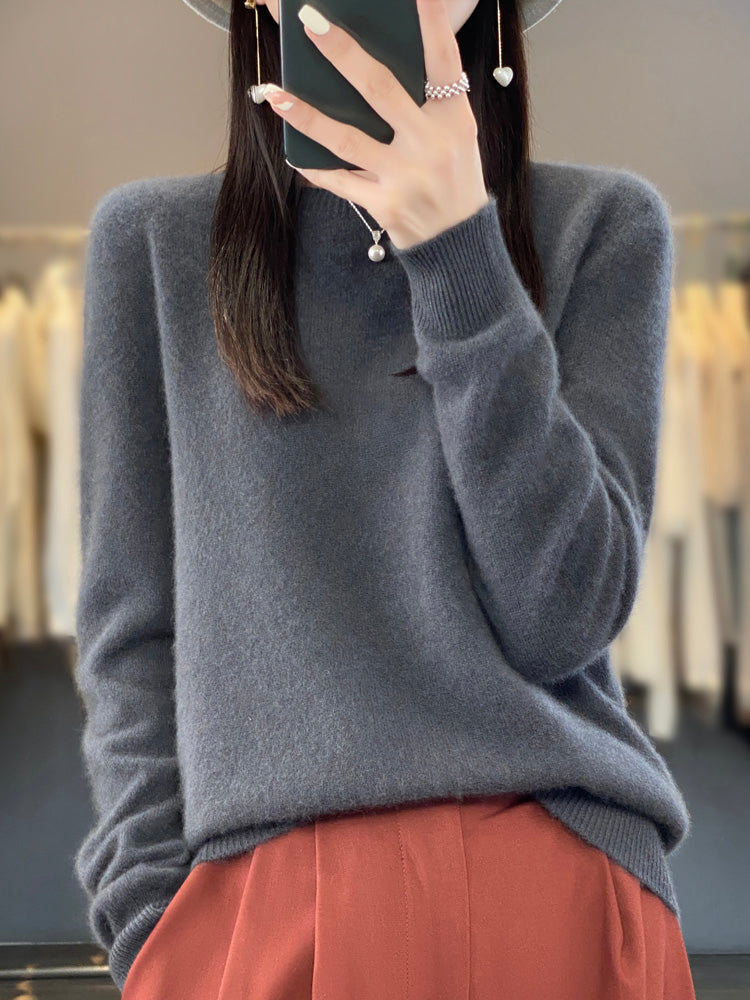Stylish grey women's round neck pullover sweater, relaxed fit for comfort.
