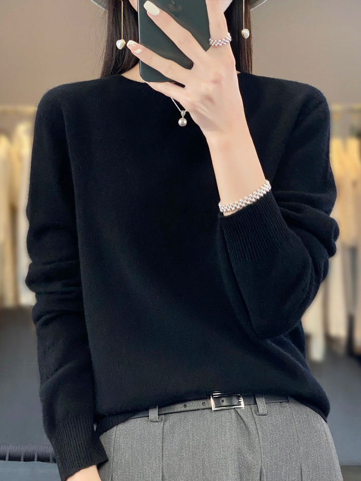 Navy women's relaxed fit round neck pullover, ideal for everyday casual style.