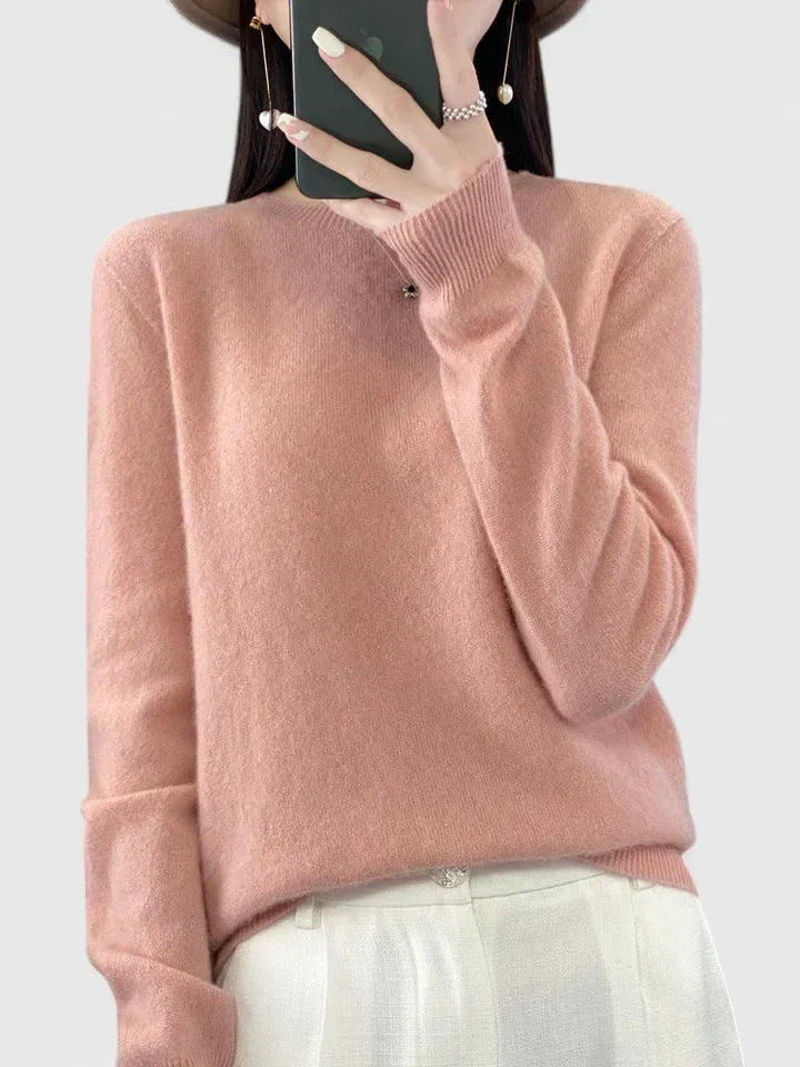 Versatile women's round neck pullover sweater, easy to dress up or down.