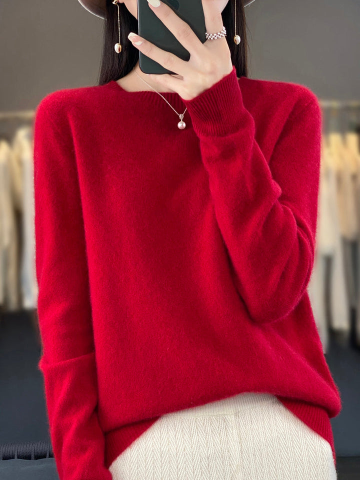 Front view of women's round neck pullover sweater, cozy and relaxed fit.