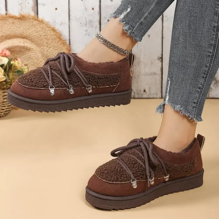 Detail of the durable sole on women's sherpa fleece-lined winter boots, great for traction