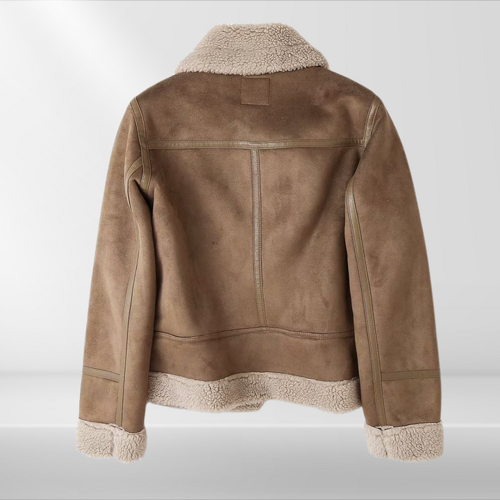 Stylish women's zip bomber jacket in soft sherpa fleece, offering cozy warmth for casual fall and winter outfits.