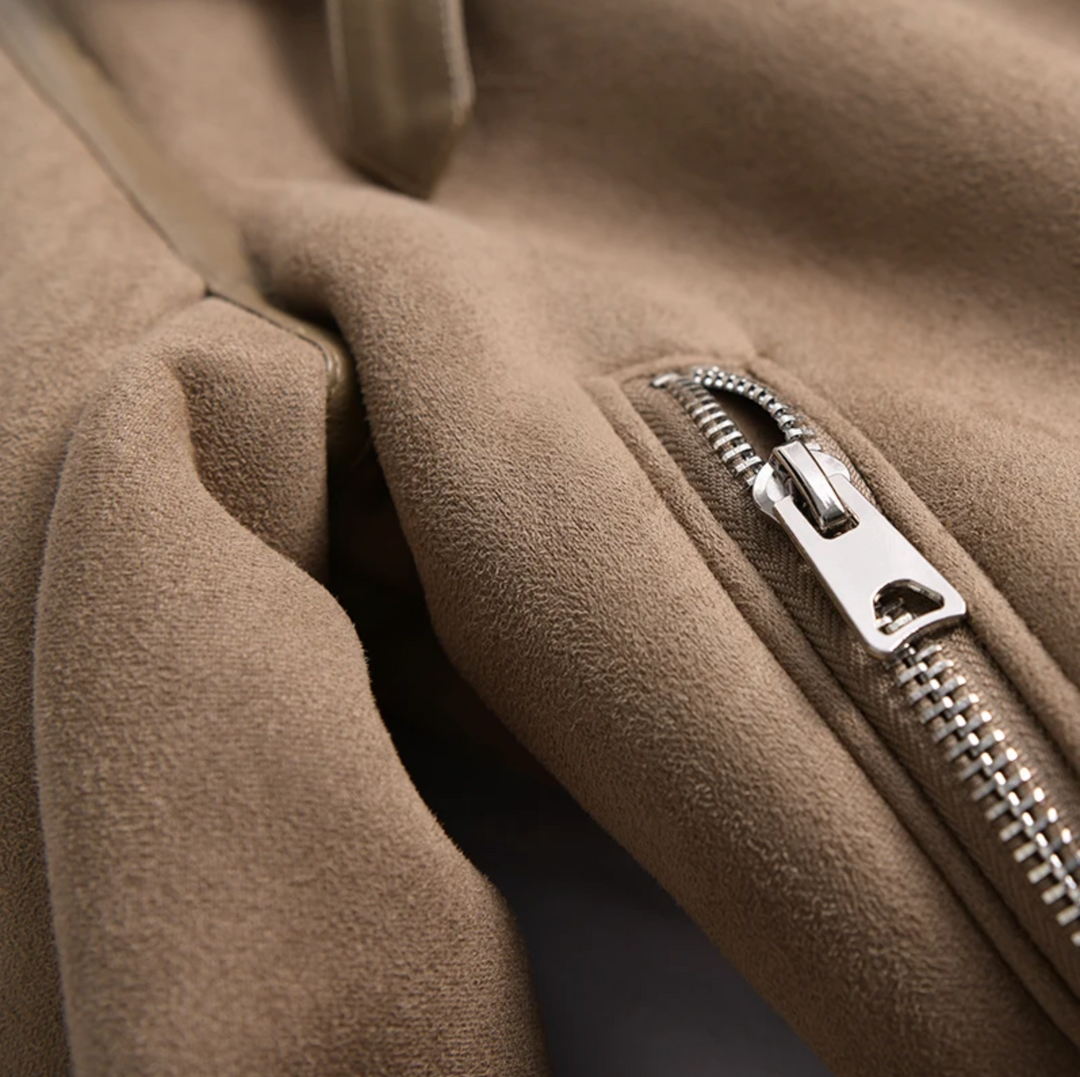 Soft women's sherpa fleece bomber jacket. A modern zip design offering cozy comfort for stylish fall outerwear.