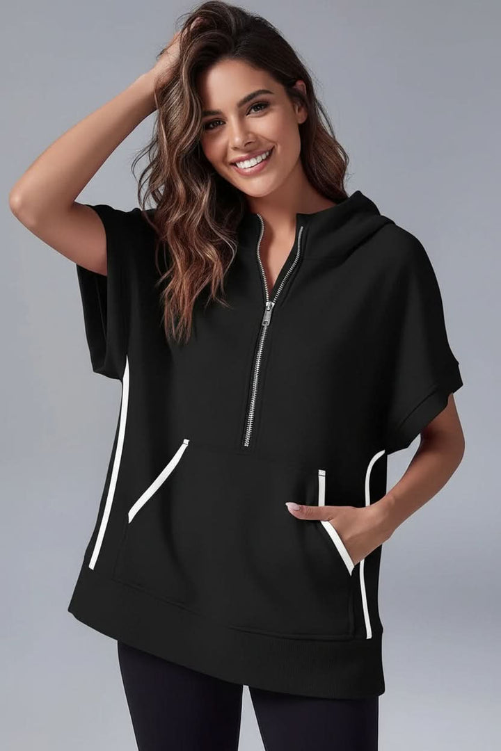 Cozy women's pullover short sleeve half-zip hoodie, relaxed fit, perfect for comfortable and easygoing style.