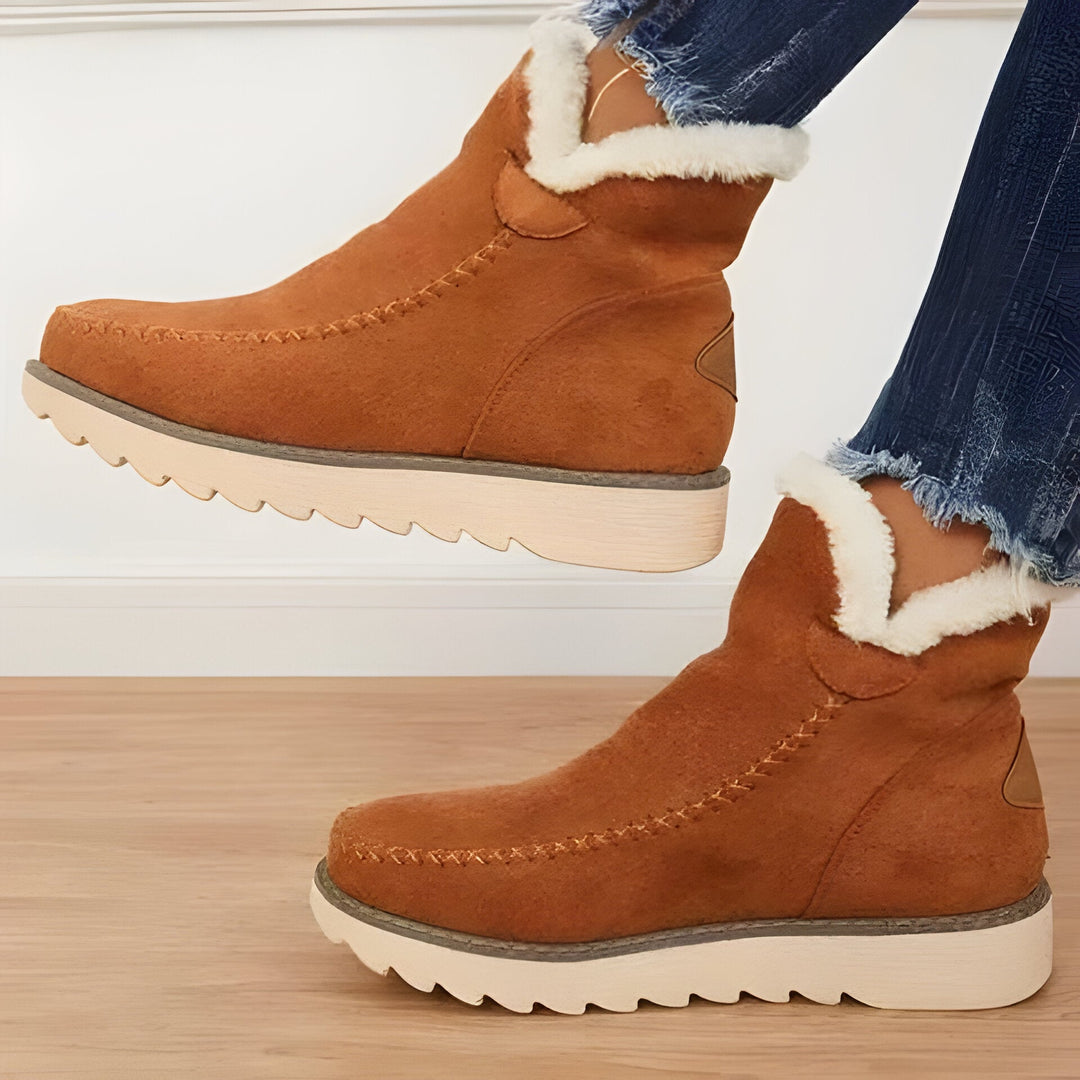 Cozy women's slip-on booties, ideal for winter. Warm, comfortable, and stylish casual everyday footwear.