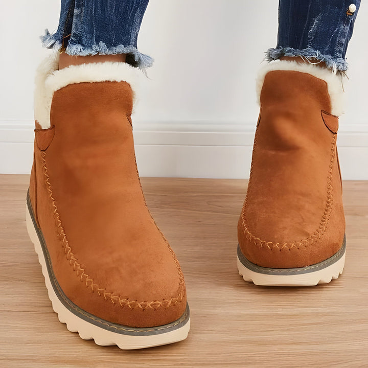 Comfortable women's winter slip-on ankle boots with arch support; warm, cozy, & shock absorbing.