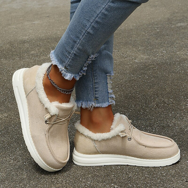 Women's cozy slip-on winter shoes with plush lining for warmth & comfort, ideal for everyday wear.