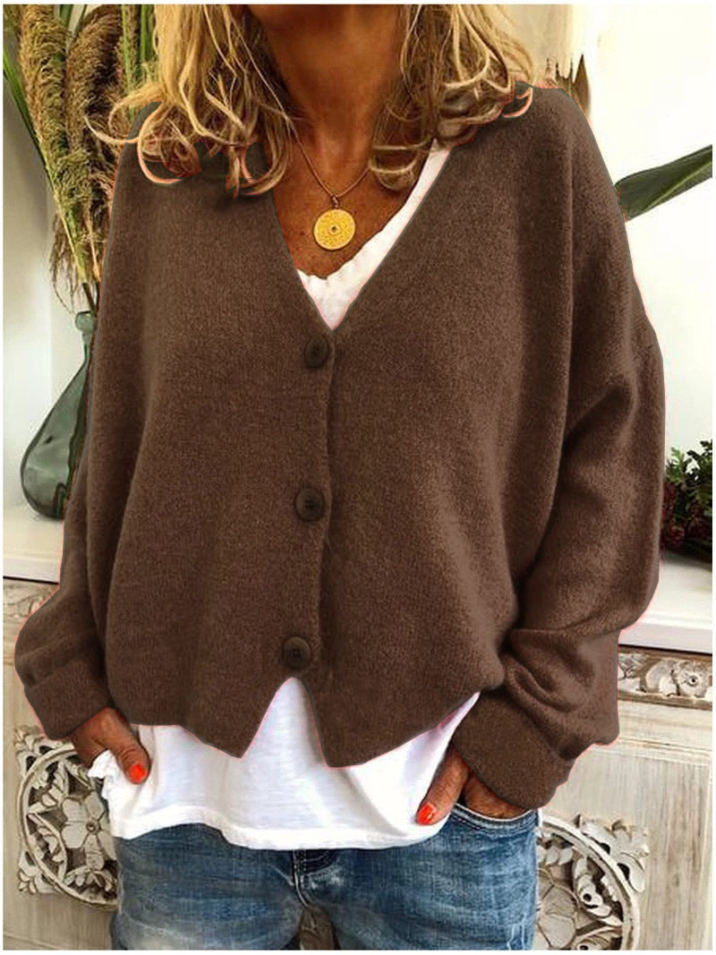 Grey women's versatile cardigan, ideal for casual autumn & winter looks, offering warmth.