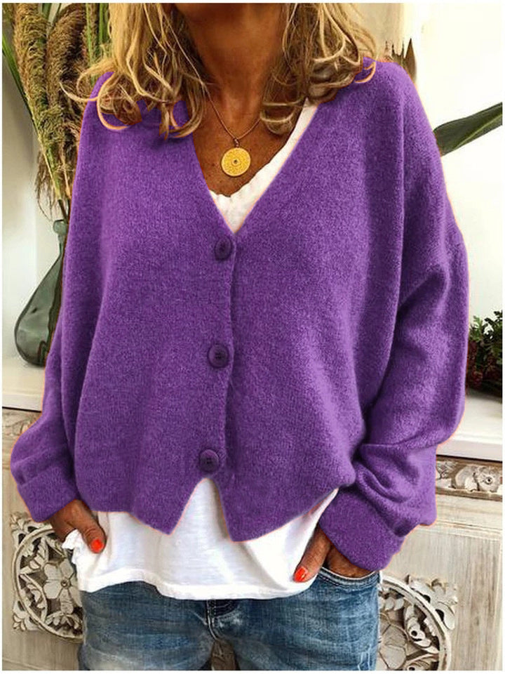 Full shot of a woman wearing a cozy soft everyday cardigan, showcasing its comfortable fit.