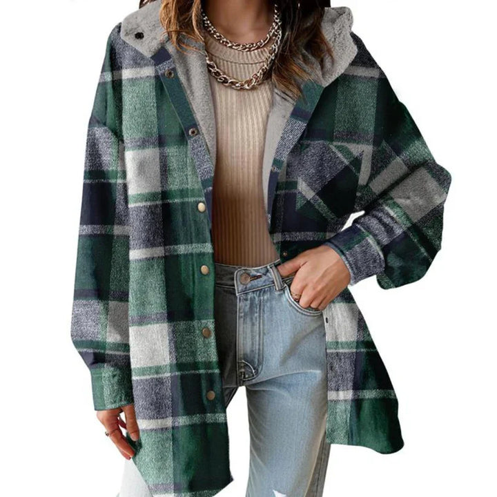 Women's teddy bear shacket with classic plaid pattern. Oversized, warm outerwear for cold seasons.