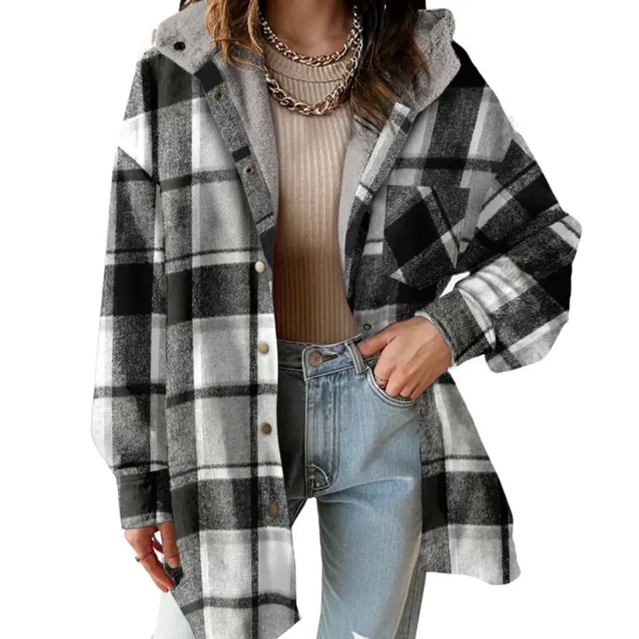 Stylish women's plaid shacket in a teddy bear fabric, perfect for fall/winter casual wear.