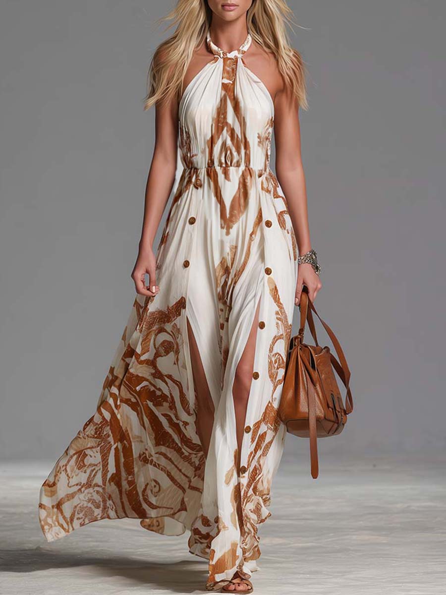 Women's cream abstract print halter neck flowy maxi dress with side split, perfect for summer vacation.