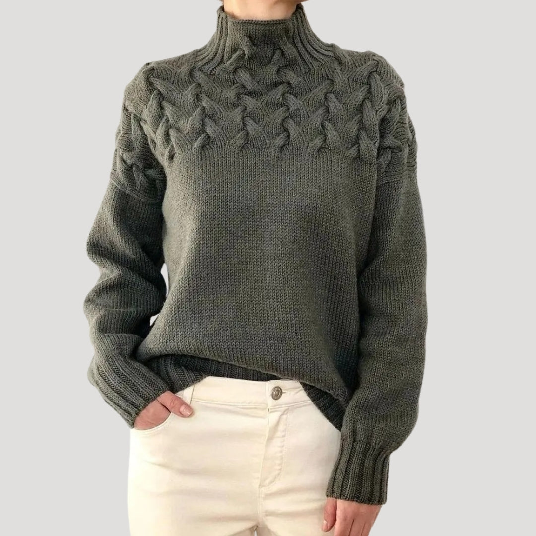 Front view of a women's solid color cable knit high-neck spring sweater, comfortable and chic