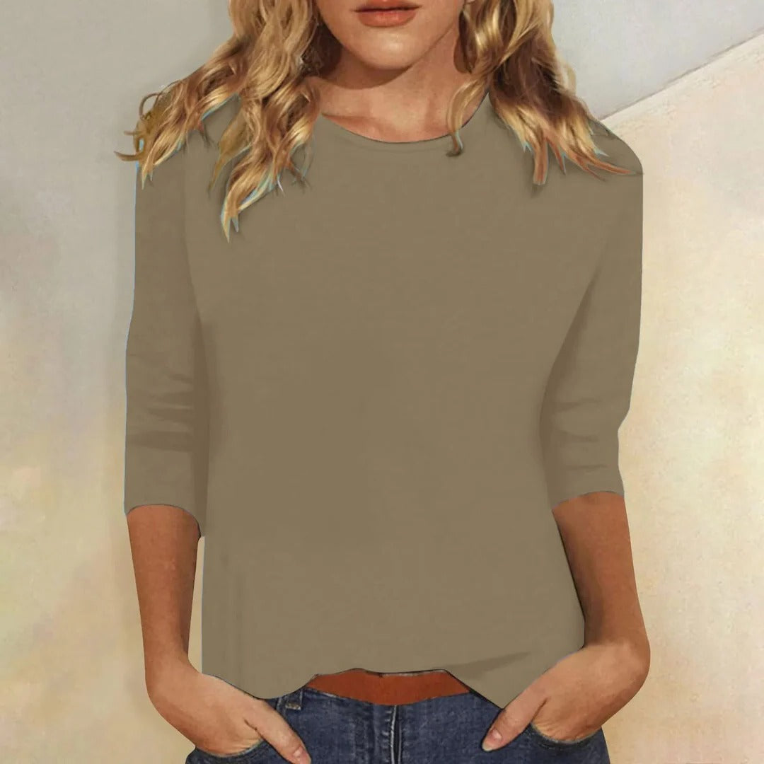Women's comfortable crew neck 3/4 sleeve top. Relaxed fit for versatile, everyday casual wear.
