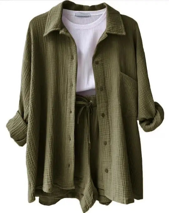 Women's button-up top from the crinkle lounge set, shown in a relaxed untucked style in a delicate lilac.