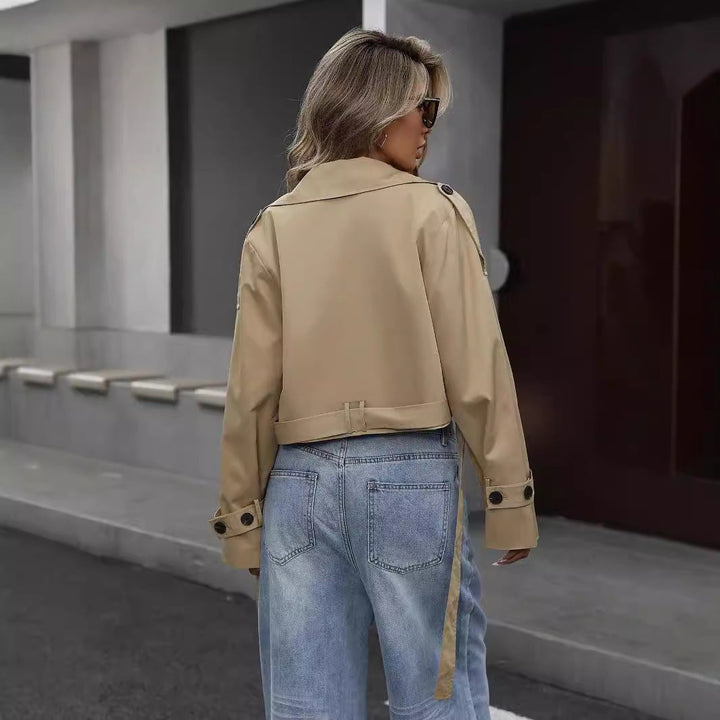 Stylish women's cropped trench jacket with double-breasted design, versatile fall fashion.