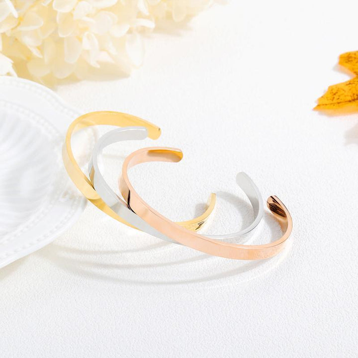 Adjustable women's bracelet featuring a delicate crown engraving, inspirational jewelry gift