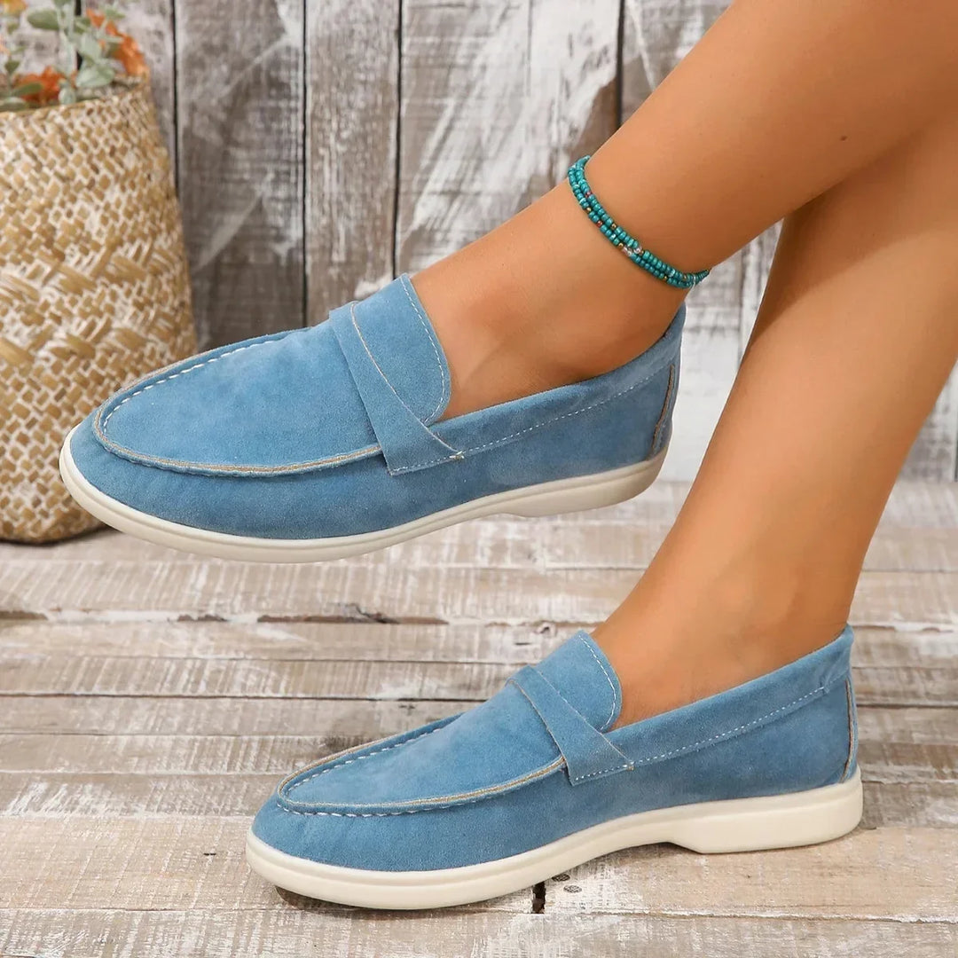 Classic women's slip-on loafers, offering everyday comfort & timeless style for any occasion.
