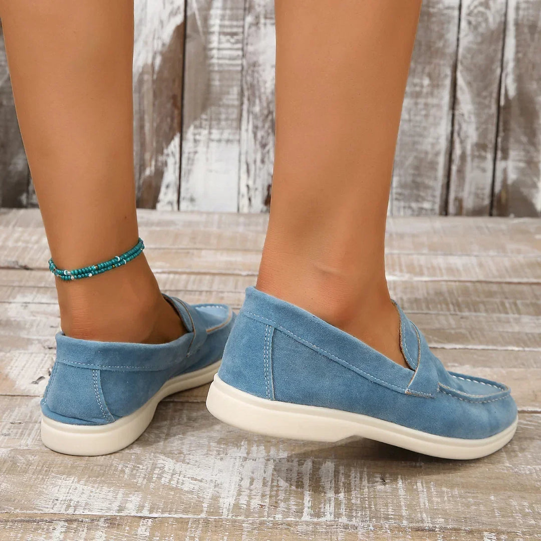Cushioned women's slip-on loafers, ideal comfortable flat shoes for work or casual outings.