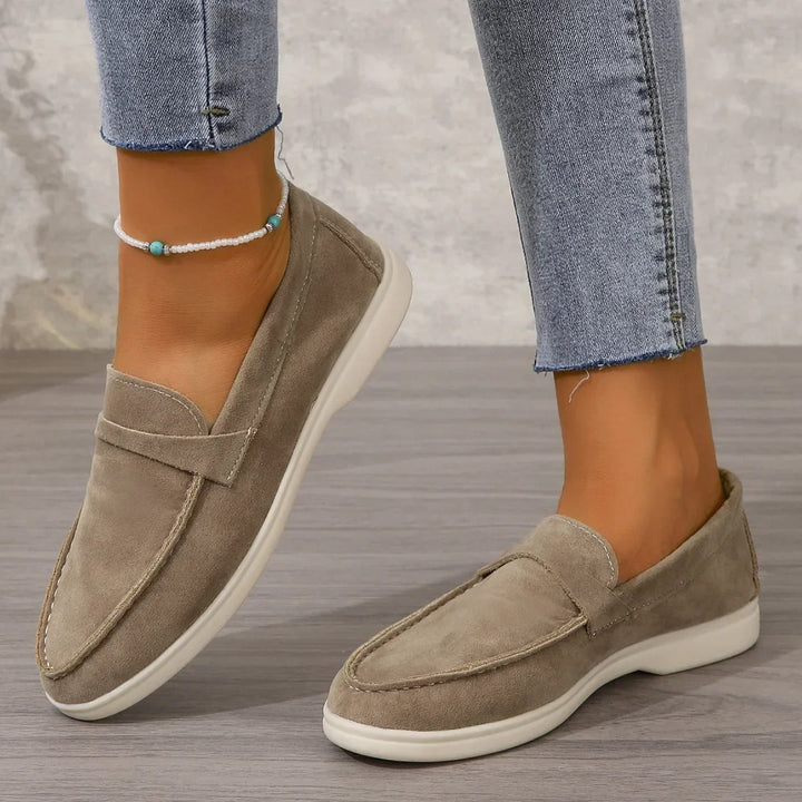 Timeless women's slip-on loafers with cushioned insole for all-day wear.