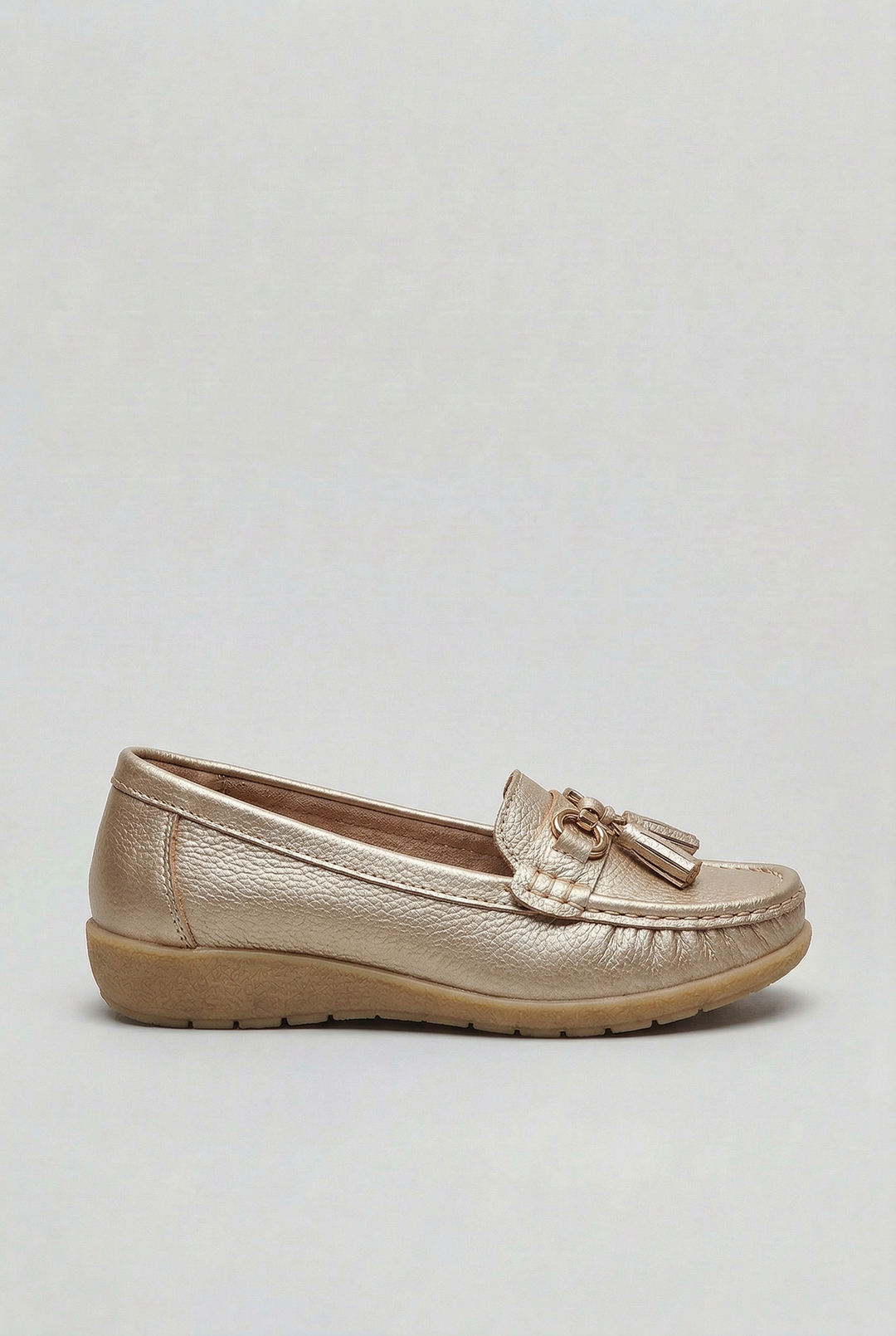 Classic women's slip-on loafers in a neutral shade, designed for comfort & casual style.