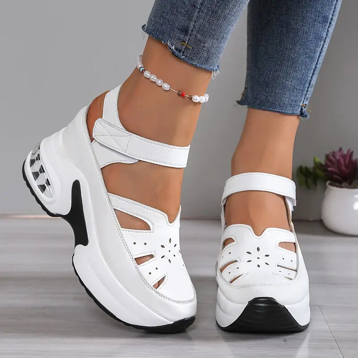 Stylish women's platform wedge sandals with breathable cutouts & adjustable straps for summer.