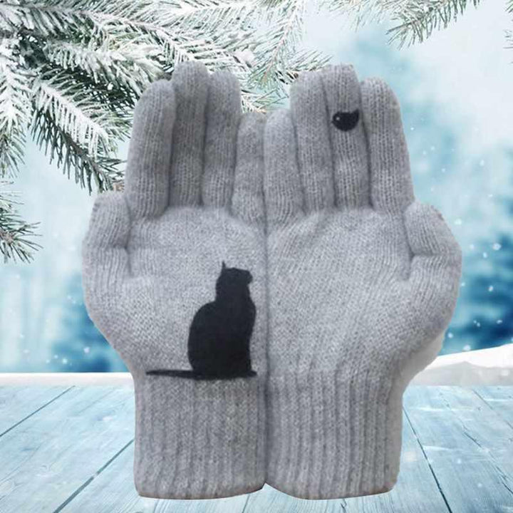 Close-up of a women's cotton winter glove featuring a charming cat pattern.