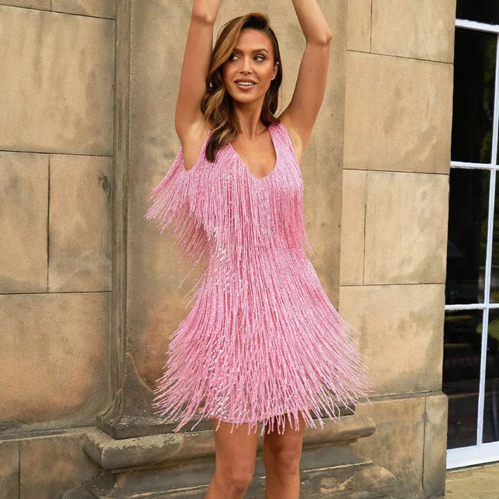 Elegant women's sequin fringe tiered mini dress. Sparkly V-neck party wear for dazzling evenings.