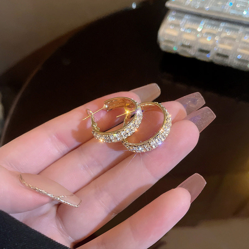 Gift-ready women's small hoop earrings, featuring a dazzling rhinestone design, a beautiful accessory