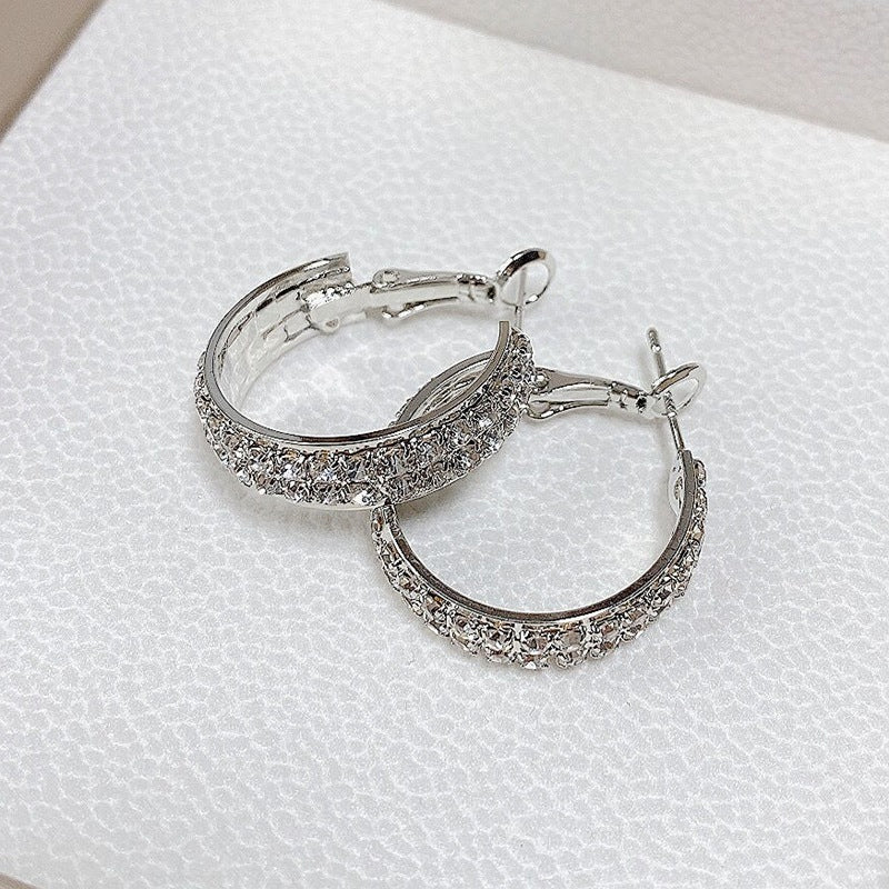 Pair of dazzling small hoop earrings for women, featuring brilliant sparkle, trendy accessory