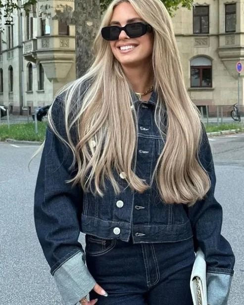 Stylish women's spring co-ord featuring a cropped denim jacket and high-waisted pants