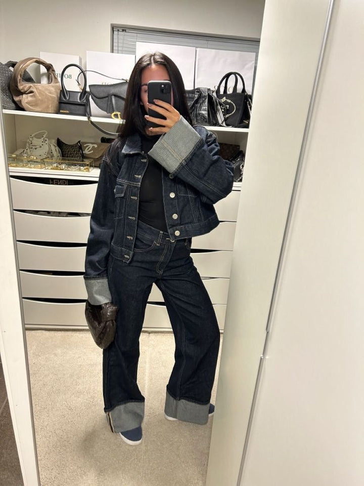 Back view of the women's denim cropped jacket and matching casual pants co-ord