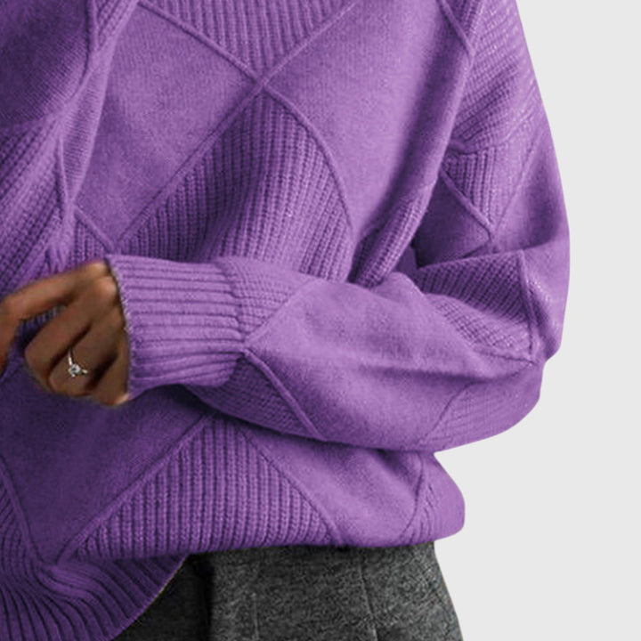 Women's cozy roll neck jumper with a unique diagonal seam design, ideal for cold weather.