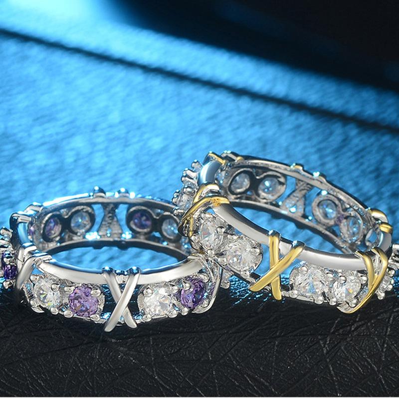 Side view of a women's dichroic zircon ring, showcasing details