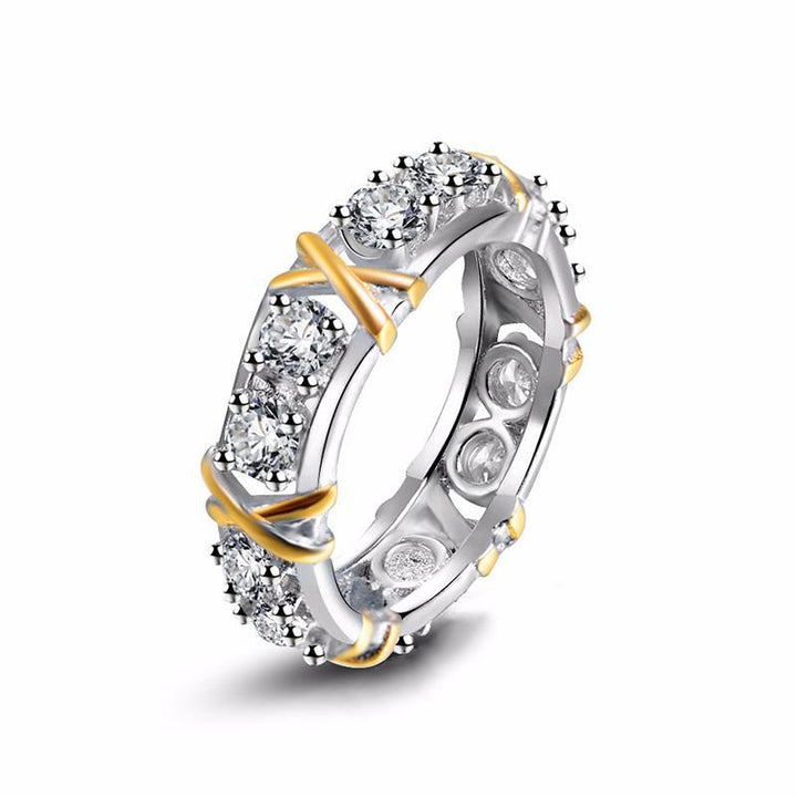 Women's dichroic zircon ring with a radiant, iridescent stone